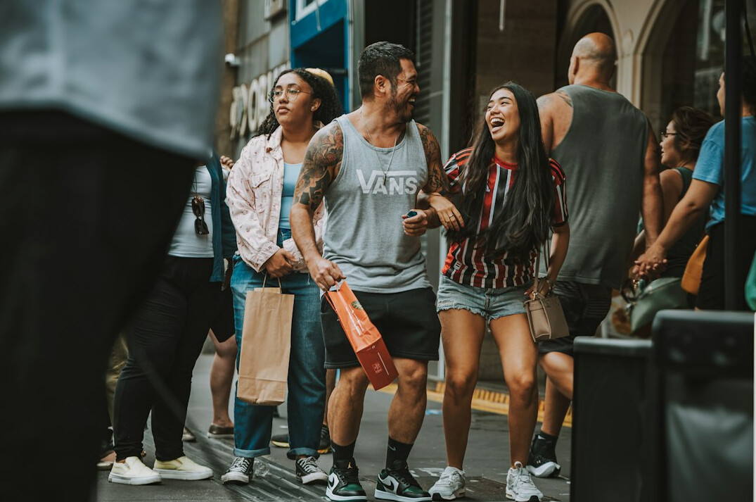 people greeting each other on street