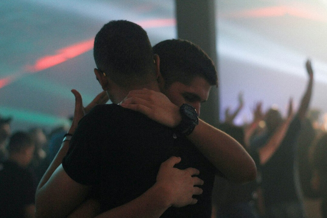 people hugging in difficult times